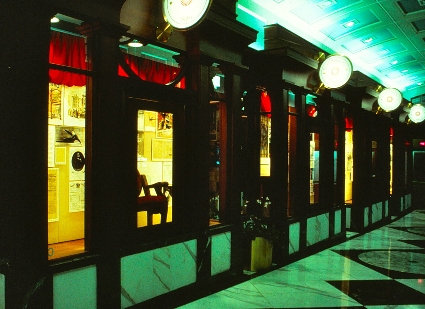 Interior lobby galleria, wood framed with glass enclosures.