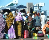 Hajis with carry on luggage