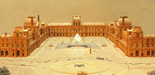 An overview of I.M. Pei's wood model of the Cour Napoleon at the Louvre Museum, which is the central outdoor square.