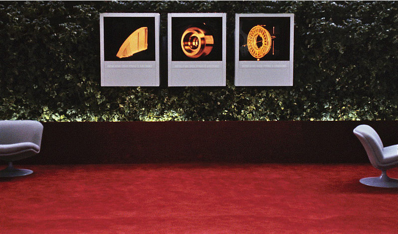 The three screen Magic Mirror 
	dissolve display with the Ivy Wall behind it.